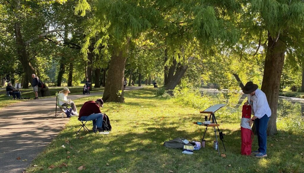 plein air painters at a park